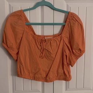 Orange puffed sleeve cropped blouse